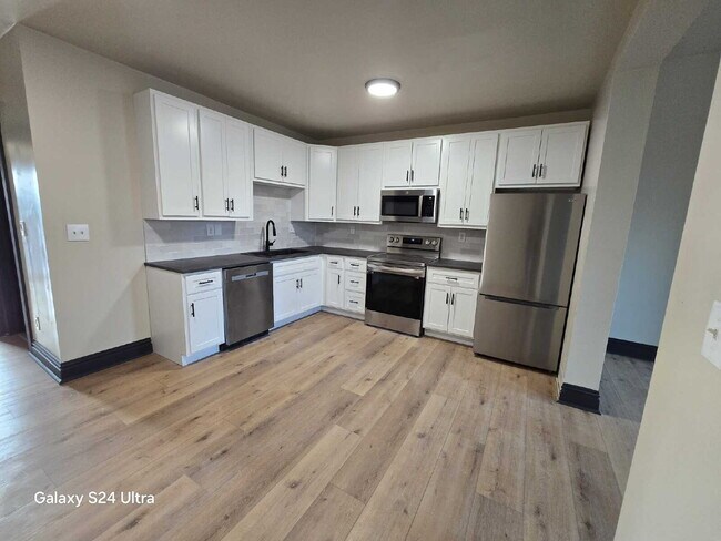 Building Photo - For Rent: Renovated 2-Story Townhouse in M...