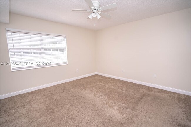 Building Photo - 7090 NW 173rd Dr