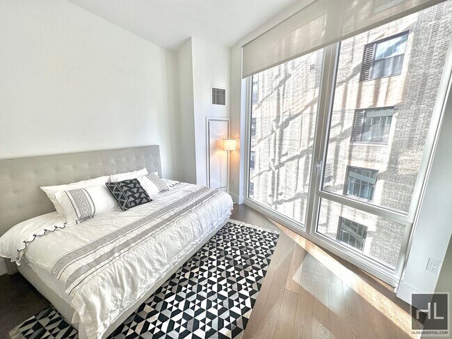 Foto del edificio - East 44th Street / Elegant 1-Bedroom in Tu...