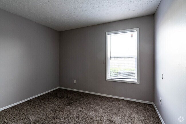 2BR, 1BA - 826SF - Primary Bedroom - River Retreat Apartments
