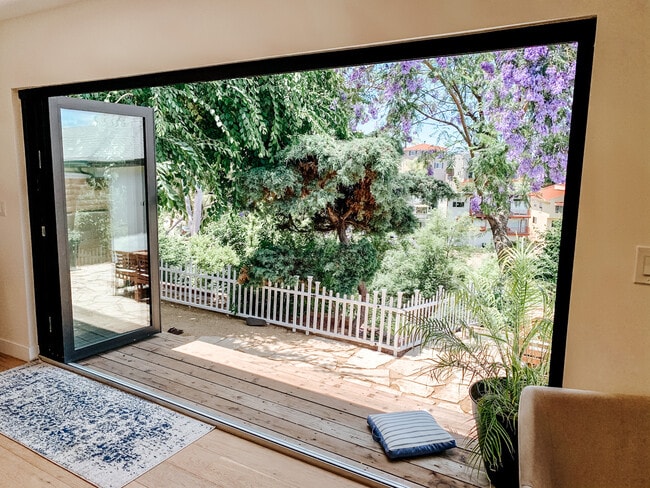 Patio doors leading to massive back yard with views! - 4255 San Rafael Ave
