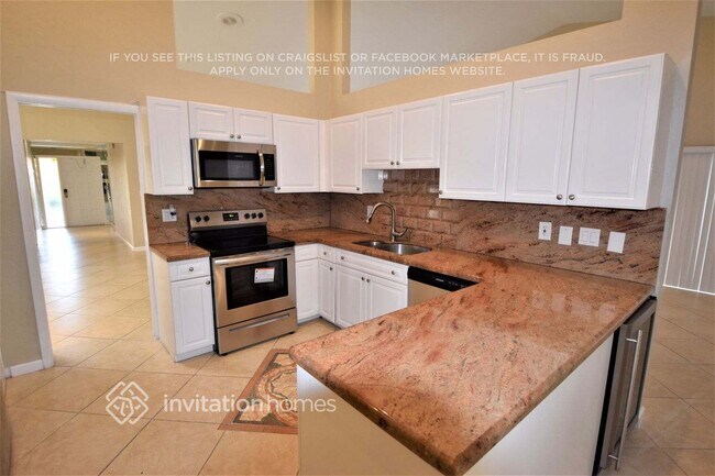 Foto del edificio - 7045 Golf Pointe Cir