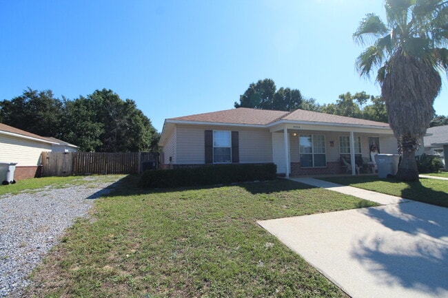Building Photo - Coastal Living in Gulf Breeze! Spacious 2B...