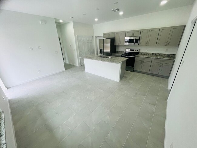 Building Photo - BRAND NEW CONSTRUCTION- ONE OF A KIND-ONE BEDROOM, ONE BATH-ONE CAR GARAGE- LEHIGH ACRES