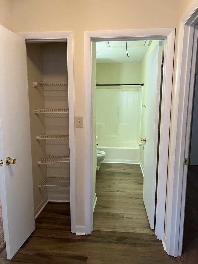 Spacious bathroom and linen closet - 64 Willow Way