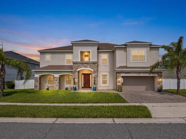 Foto del edificio - Spacious 6-Bedroom Home Near Lake Nona | 3-Car Garage + Tesla Charger