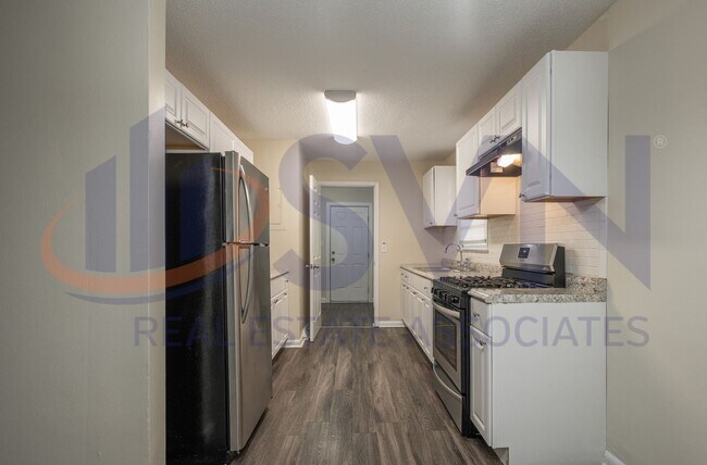 Foto del edificio - 3-Bedroom Home with Modern Touches