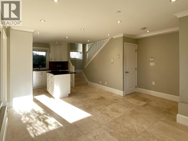 Photo du bâtiment - 2XX W 46th Ave