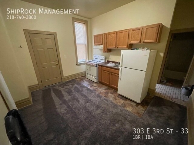 Foto del edificio - 303 E 3rd St