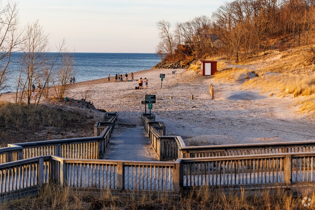 People flock to Sandy Island Beach State Park to swim and enjoy other beach activities.