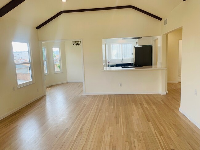 Living room and open kitchen - 3521 S Victoria Ave
