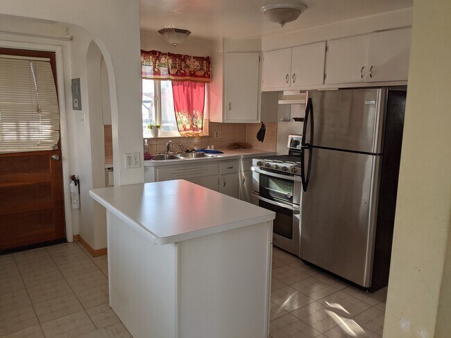 Kitchen with double oven, fridge washer/dryer - 4716 W 10th Ave