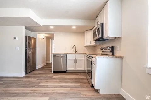 Kitchen with stainless steel appliances - 530 W 900 S