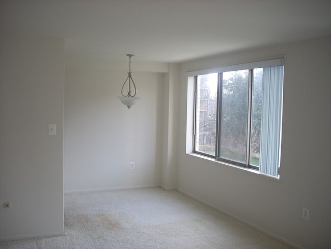 Building Photo - A renovated efficiency located on the four...