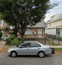 Building Photo - 206-11 109th Ave