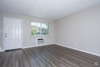 2BR, 1.5BA - 1,025SF - Living Room - Dover Park Apartments