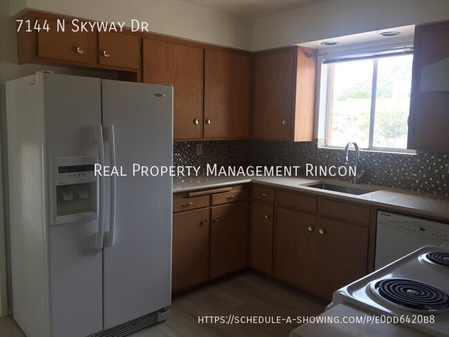 Building Photo - 7144 N Skyway Dr
