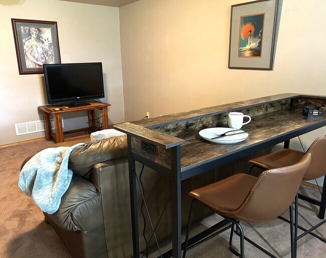 Eating bar area-watch TV - 205 S West Ave