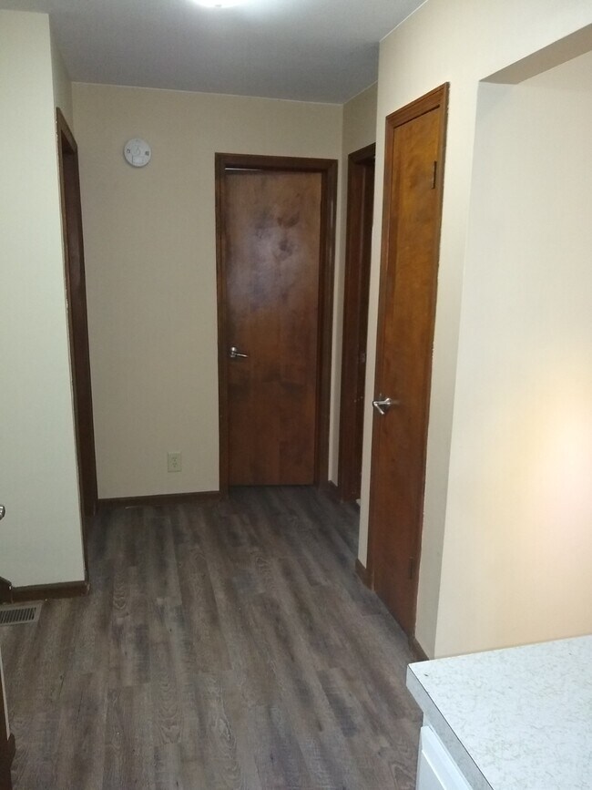 Hall (with brand new floor). - 664 E 12th St