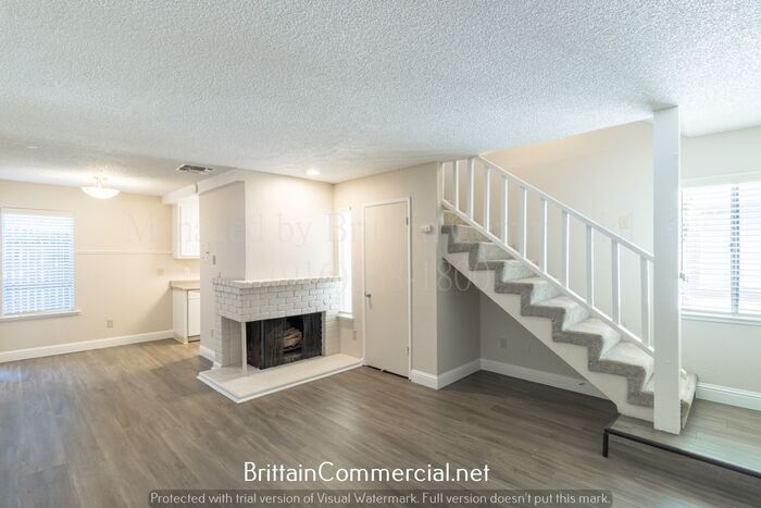Primary Photo - Spacious Two-Bedroom Townhome w/Modern Int...
