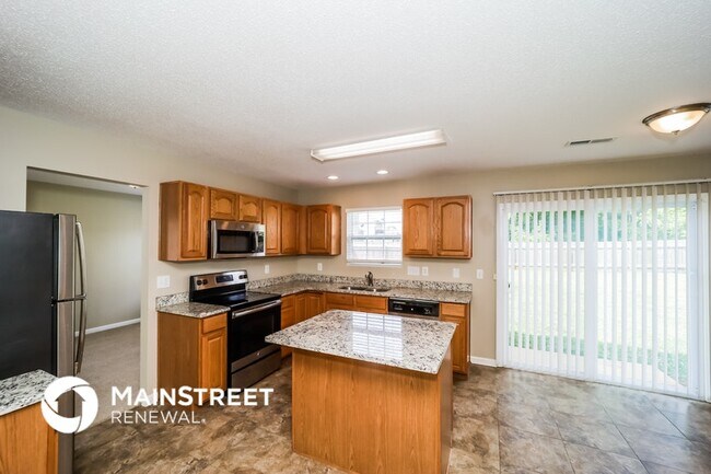 Foto del edificio - 5203 Weeping Cherry Dr