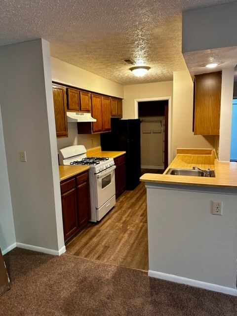 Galley style kitchen with gas stove - 2229 Hedgerow Rd