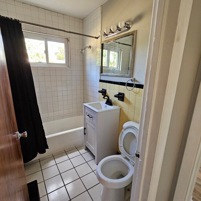 New vanity and tub faucets - 3208 Keays Ave