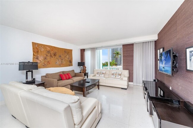 Building Photo - 10275 Collins Ave