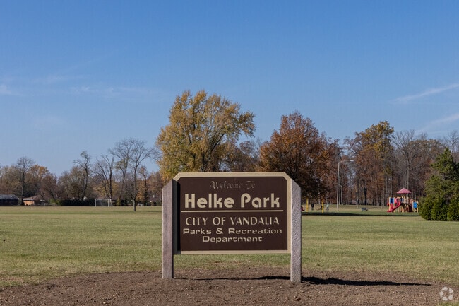 Helke Park has numerous amenities including sports fields, a playground, and tennis courts.