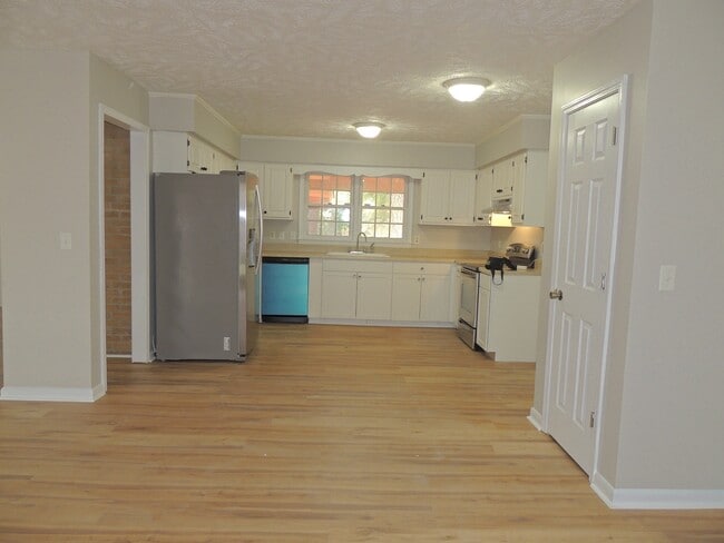 Building Photo - 7115 Enfield Dr