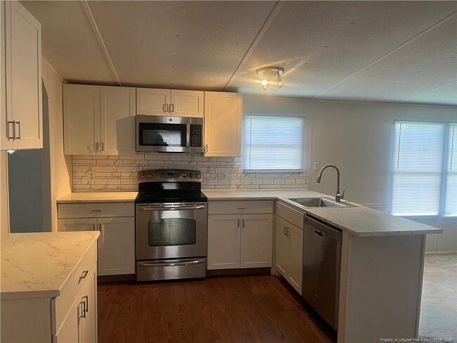 Building Photo - 6124 Heath Hawkins Ct