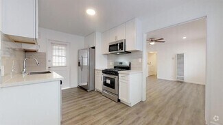 Building Photo - 7110 1/2-7012 Flight Ave