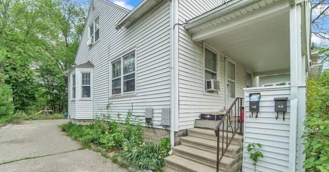 Side view of the house. Drive way view - 1837 Beal Ave