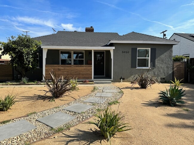 Drought Resistant landscaping and tangerine tree - 5950 Simpson Ave