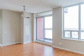 Located at 171 Main St N in Brampton, Ontario, this three-bedroom, two-bathroom unit offers a well-organized single-floor layout designed for comfortable everyday living. Warm-toned hardwood flooring runs throughout the main living areas and bedrooms, creating a cohesive and inviting atmosphere. The living room is a bright, open space anchored by large floor-to-ceiling windows and a sliding glass door that leads to a private balcony, offering elevated views of the surrounding Brampton neighbourhood. Natural light fills the room generously, enhancing its airy feel. The kitchen is efficiently laid out with tile flooring, standard appliances, and a functional countertop workspace. Each of the three bedrooms features hardwood flooring, large windows that frame outdoor views, and neutral grey walls. The primary bedroom includes a built-in sliding-door closet for ample storage. The two bathrooms are clean and practical, each featuring a full soaker tub with a shower, white square tile surrounds, and chrome fixtures. A dedicated entrance provides a clear transition into the unit. Throughout, the space maintains a neutral, modern palette with textured ceilings, making it a functional and comfortable home in a convenient Brampton location.