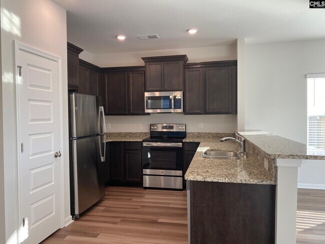 Building Photo - 412 Sandfarm Trail