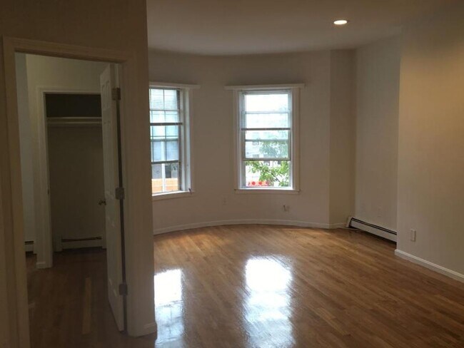 Building Photo - No Brokers Fee, Eat-in Kitchen, Steps from the T Stop