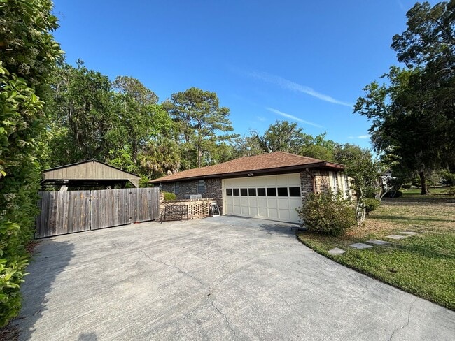 Photo - Spacious 4 Bed 2 Bath Home w/ Garage. Fenced in Yard. Large Private Pool!