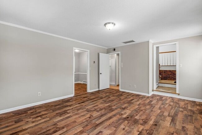 Building Photo - Large Home in Four Seasons Area, Hardwoods, Dining Room, Screed Porch, Fenced!