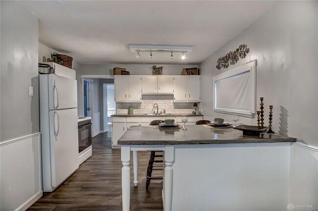 kitchen with polished concrete counter top - 2745 Gladstone St
