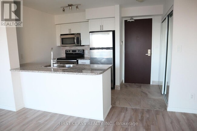 Photo du bâtiment - 208-2208 Enfield Pl