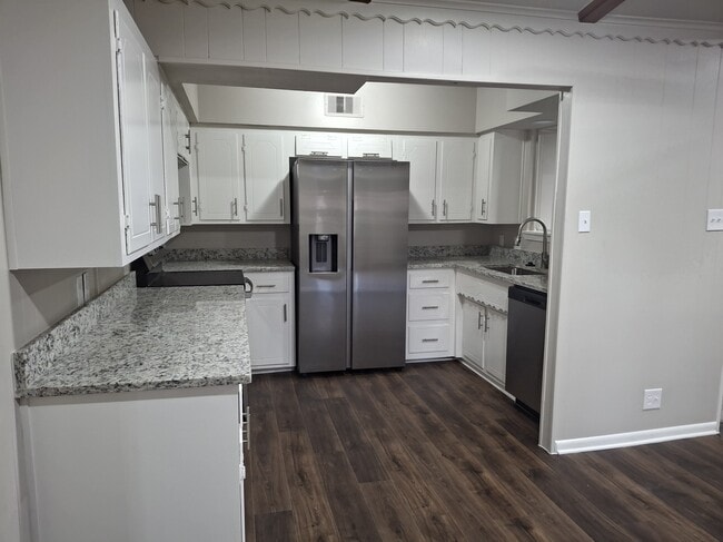 Kitchen with stainless steel appliances - 544 Willowood Ln House