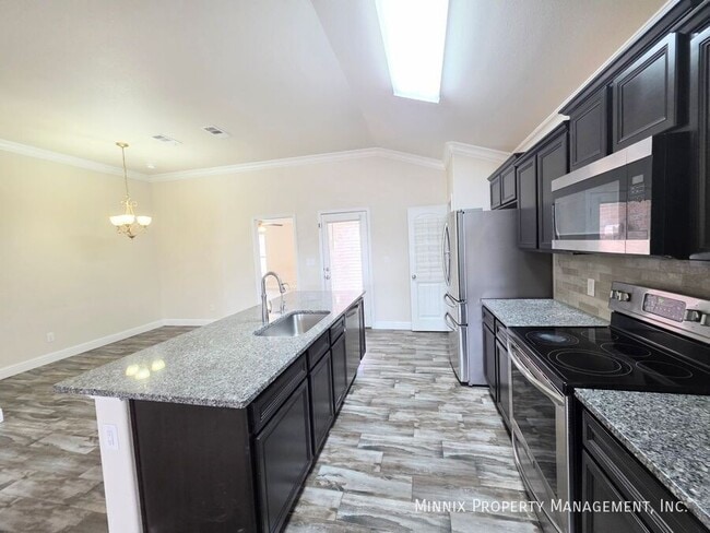 Building Photo - 9411 Sagebrush Ave