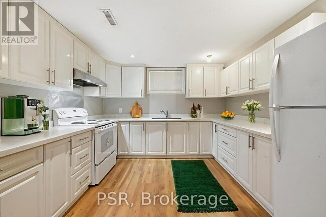 Photo du bâtiment - 54 Minnacote Ave