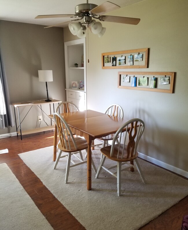 Dining area with ceiling fan - 609 11th St S