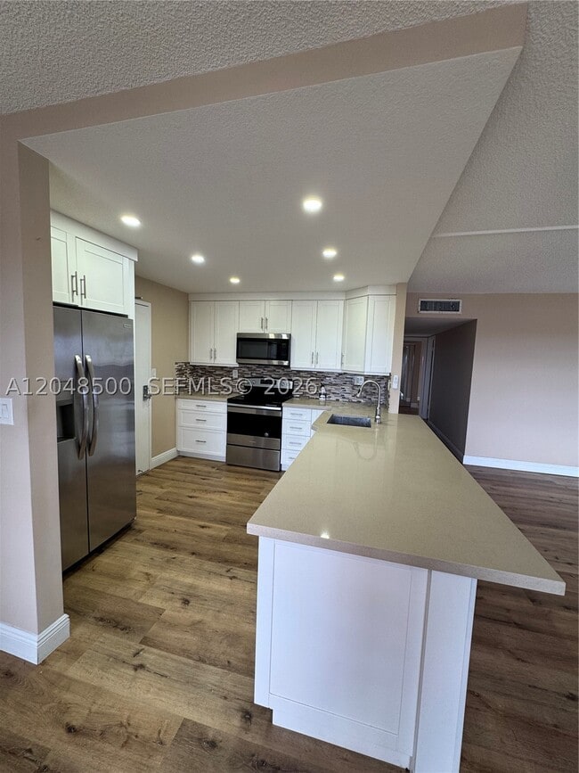 Building Photo - 10777 W Sample Rd