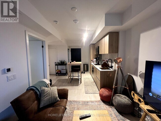 Photo du bâtiment - 117-117 Broadway Ave
