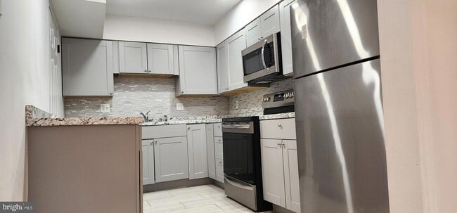 Photo - 7902 San Leandro Pl Townhome