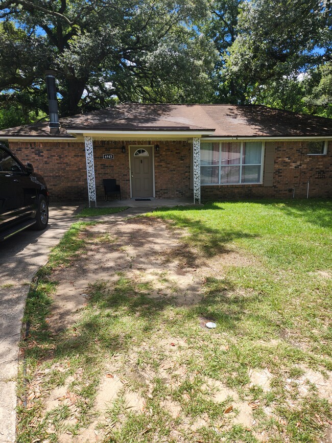 Building Photo - 6945 Woodley Dr