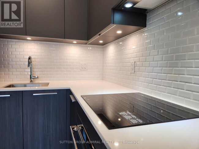 Building Photo - 65 Broadway Ave